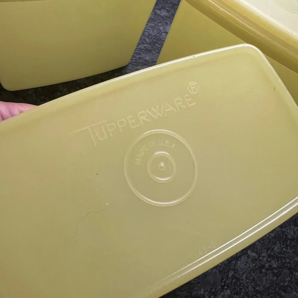 5 piece set of yellow storage containers by Tupperware. Vintage pieces e…